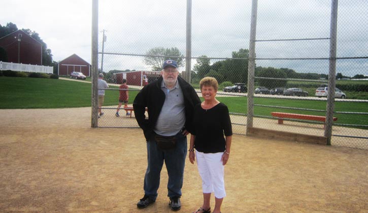 Ultimate Strat Baseball Newsletter -Wolfman and Betty Lansing together on the Field of Dreams Baseball Field near home plate, July 2016